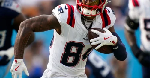 Patriots shock with trade of star WR to NFC team - bold move shakes up season dynamics!