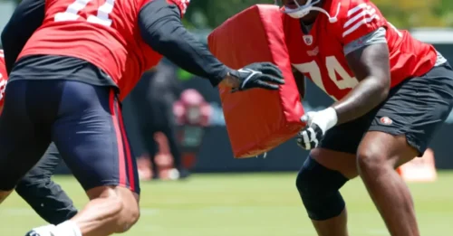 49ers’ O-Line NIGHTMARE: Spencer Burford’s Shocking Position Shift After Puni’s Brutal Injury!